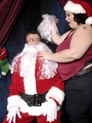 Glory Foxxx puts the XXX in XXXmas with a busty titfuck and Santa cum on her belly in Xmas sex Christmas porn pics at BBW Dreams - BBWDreams.com